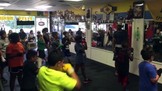 Elite boxing teaching kids the proper art of boxing