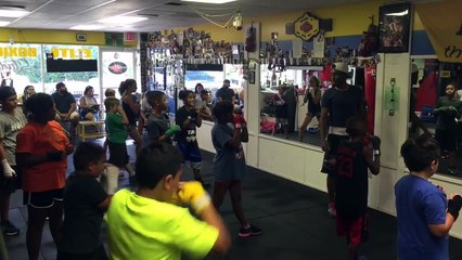 Elite boxing teaching kids the proper art of boxing