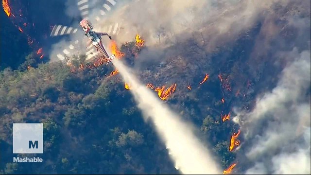 West Coast wildfires intensify in record-breaking heat