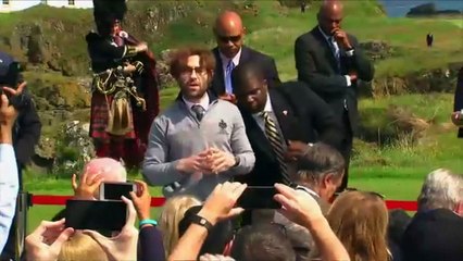 Protester disrupts Trump speech with swastika golfballs