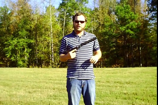 Glock 19 9mm with a Thompson Machine Isis-2 9mm suppressor