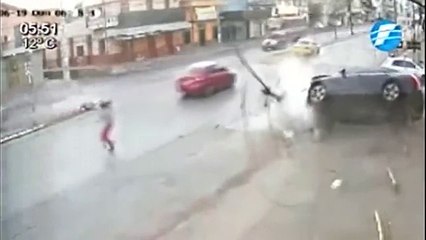 BIKER BRUTALLY HIT BY CAR