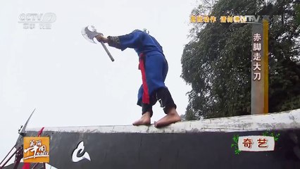 Stuntman Walks Barefoot On A Giant Knife In China