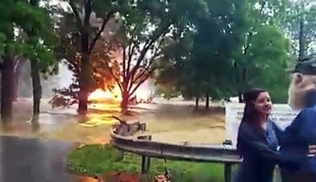 Burning House Swept Away By Floodwaters