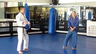 Womens UFC superstar Ronda Rousey demonstrates some of her throwing and armbar techniques in a gi