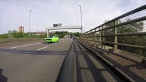 Dangerous driver almost collides with cyclist