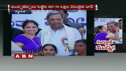 Woman kisses Karnataka CM Siddaramaiah in public