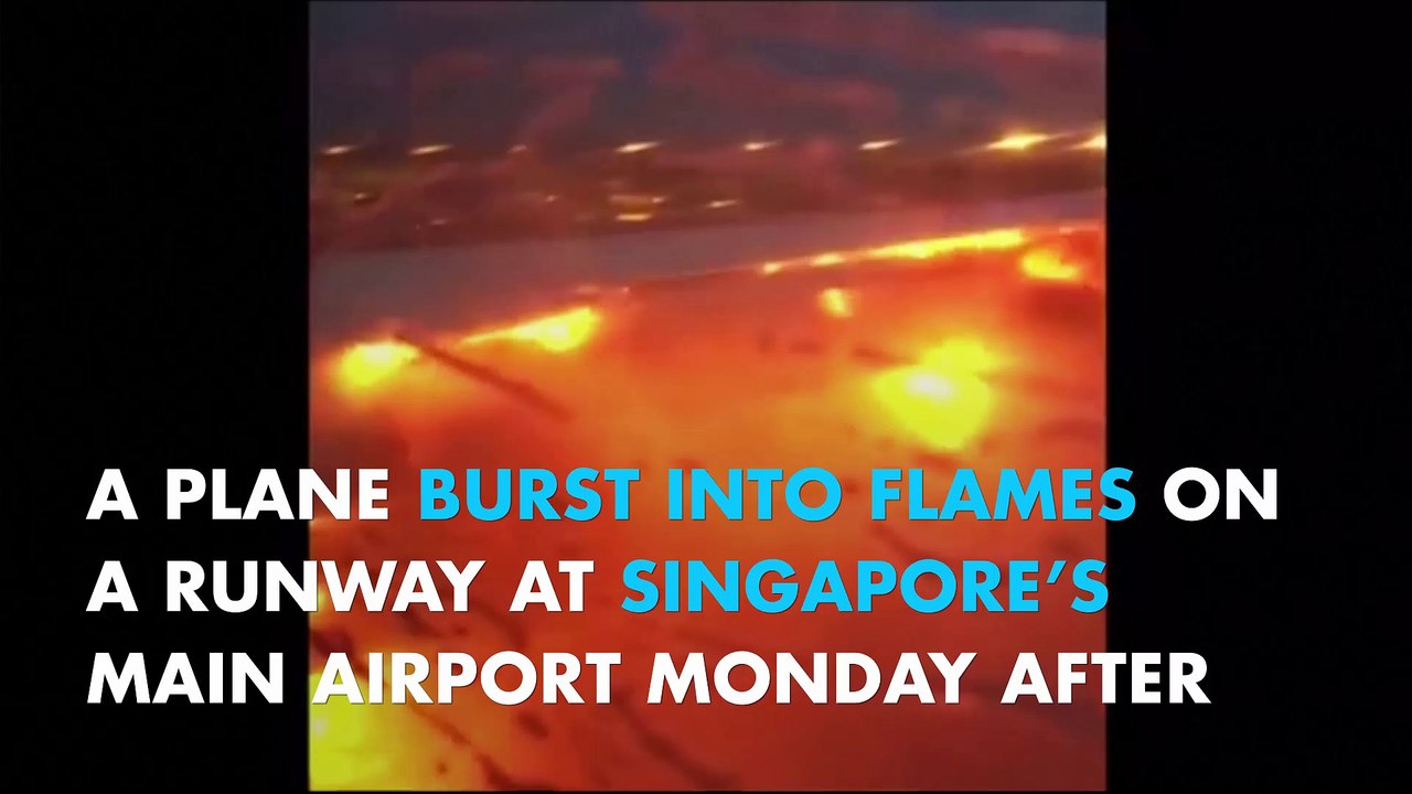 Plane bursts into flames on Singapore runway, no casualties