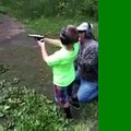 My little man (grandson) shoots .22 handgun 1st time