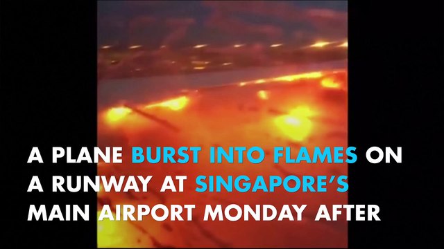 Plane bursts into flames on Singapore runway, no casualties