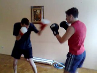 Two Krav Maga (MMA) fighters boxing 1