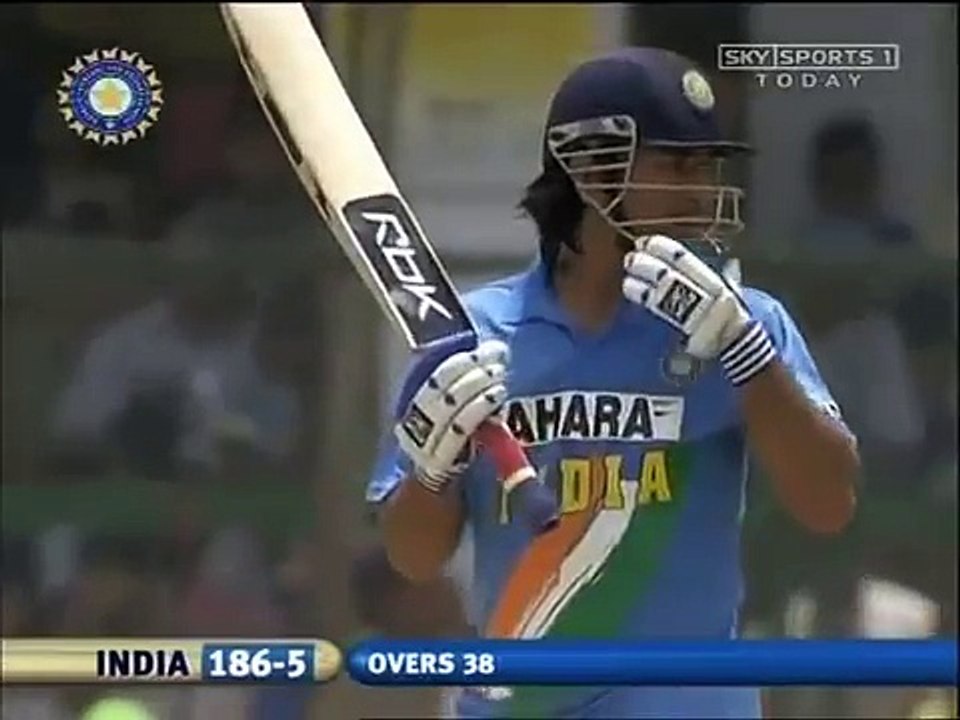 Dhoni plays with ice bags on his back,Jamsedpur 2006.