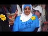 Silently protesting Muslim woman ejected from Trump rally