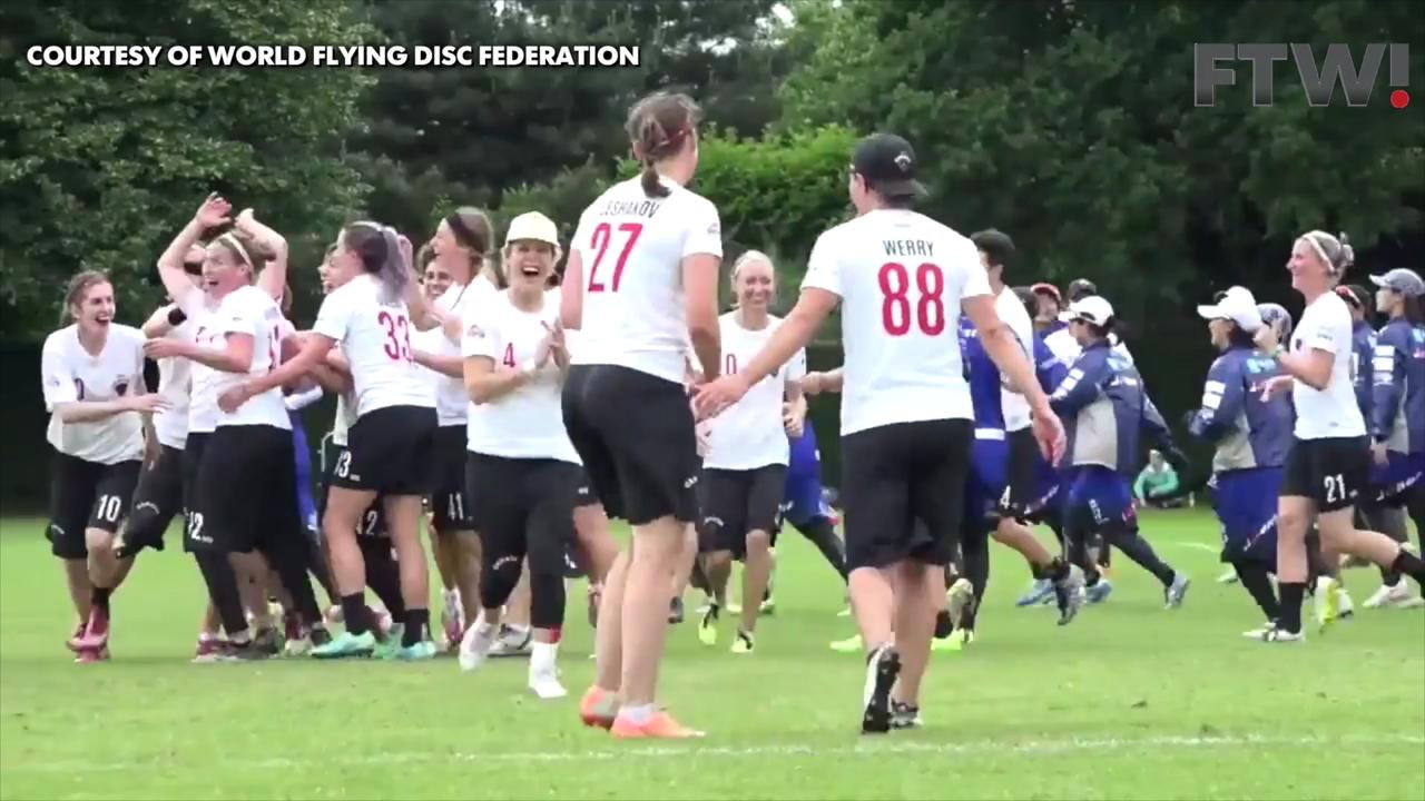 Ultimate Frisbee player makes incredible backwards falling-out-of-bounds throw