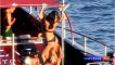 Cristiano Ronaldo parties with a pretty brunette on a boat in Ibiza Watch Video
