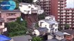 Chute d'une maison après un glissement de terrain au Japon