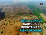 Small canals carved on mountains to fight drought