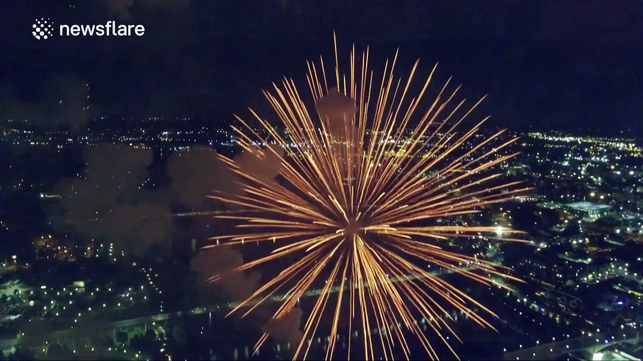 Drone flies through fireworks