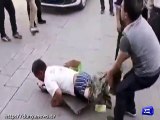 Beggar Faking Disability Gets Caught