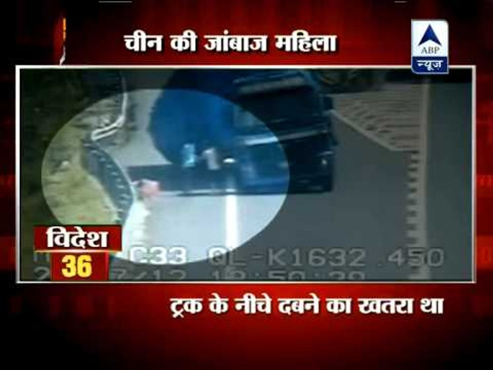 Chinese woman saves family from falling truck