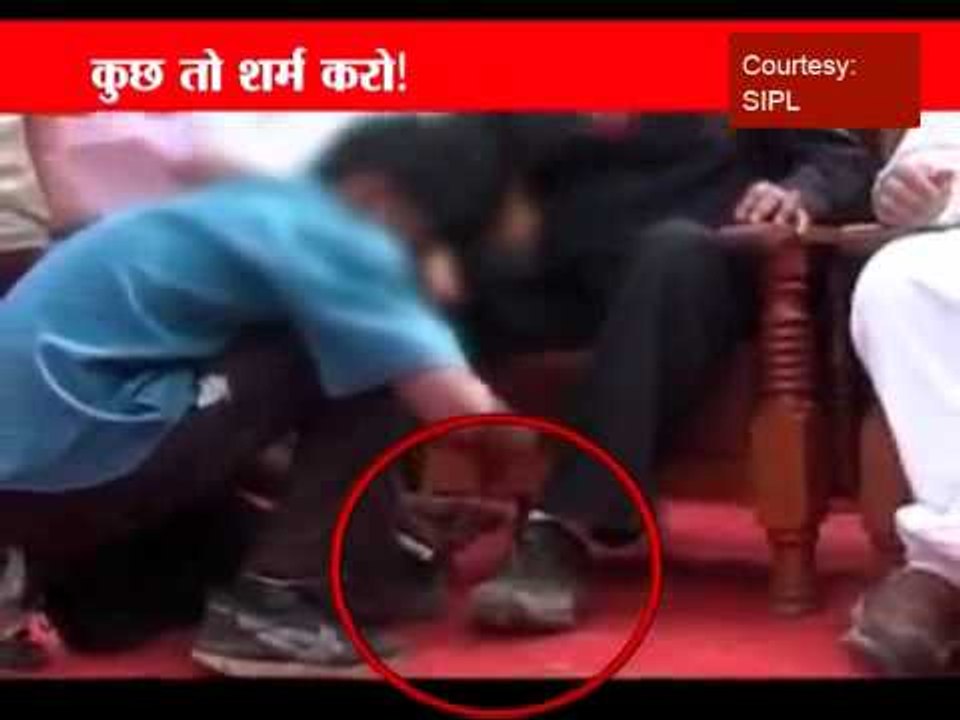 Anger over child tying shoe laces of MP minister Bhopal