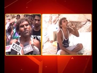 Haridwar Man Eating sand, Watch Video