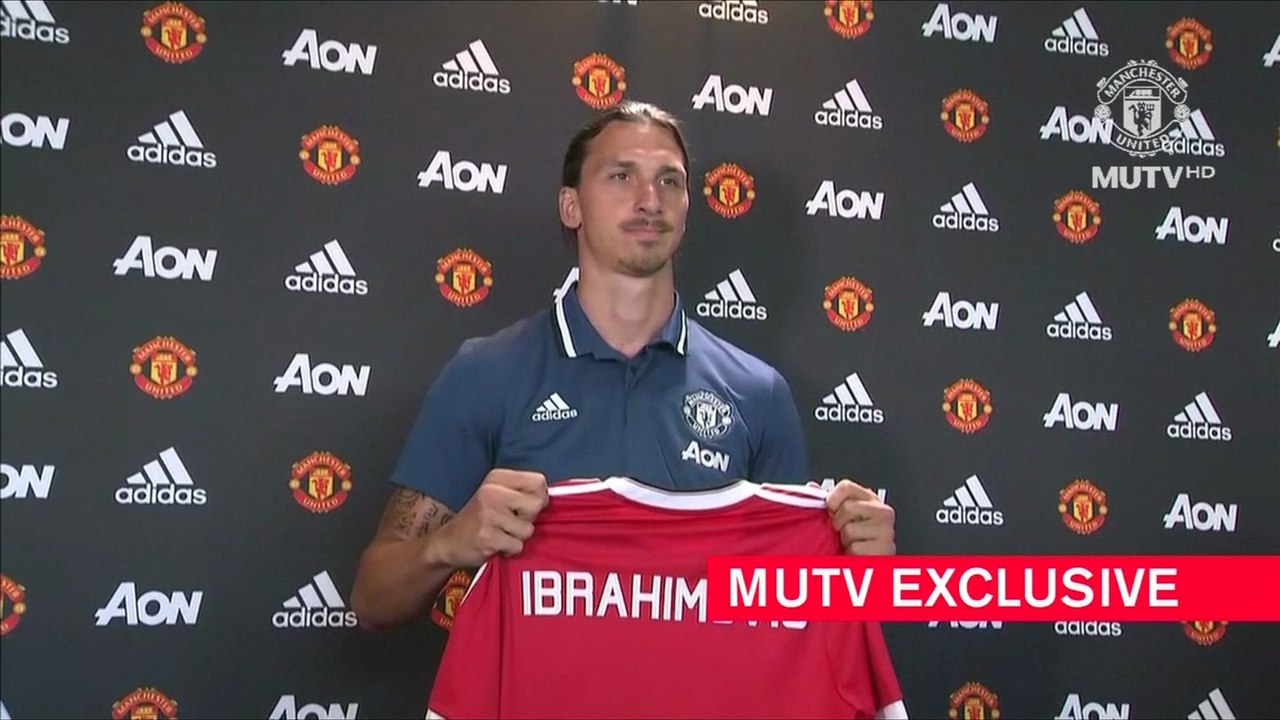 Zlatan Ibrahimovic first interview in Manchester United, posing with shirt.