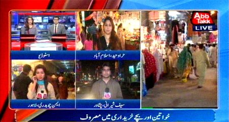 Women and children engaged in Eid shopping