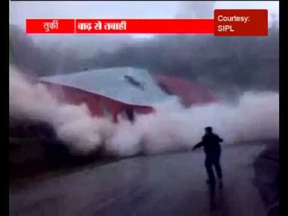 Building collapses after heavy flooding