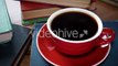 Hot Cup Of Black Coffee Stacked On Hardcover Book - Stock Footage | VideoHive 13575581