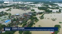 China floods: soldiers rush to rescue hundreds of people stranded