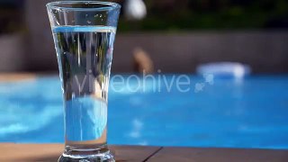 Ice Cubes Falling in Glass of Water - Stock Footage | VideoHive 10235654