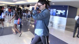 Kendall Jenner -- Covers Face ... But Not House