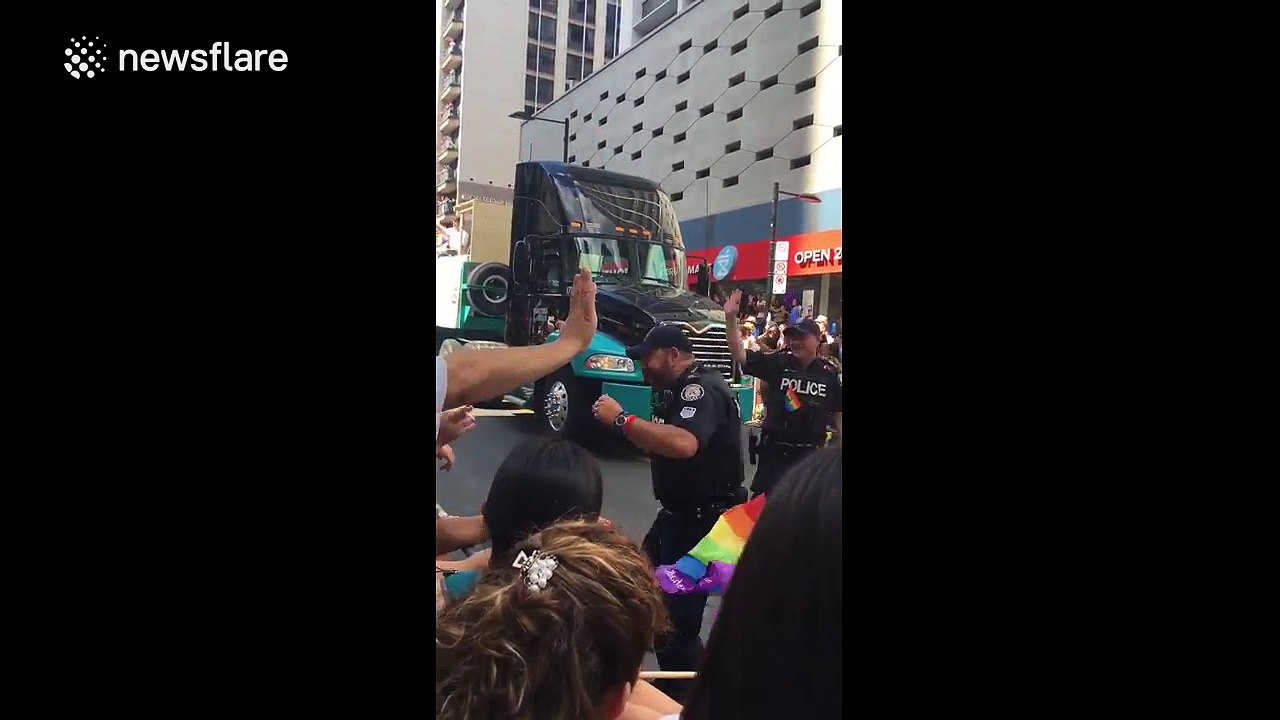 Police officer shows off dance moves at Toronto Pride Parade
