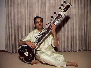 Hold Sitar and Pluck wire - How to Learn Sitar - Sharda Music