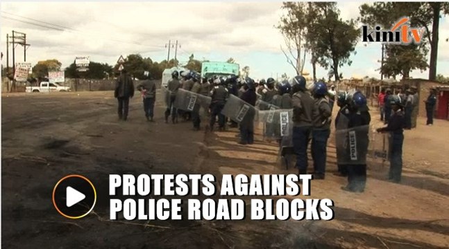 Public transport drivers protest against road blocks in Zimbabwe