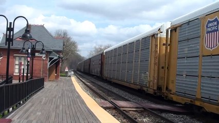 A Smoky CSXT #4740 Leads CSX Q249 through Laurel,MD 3/19/2012