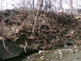 under the route 26 bridge, major gravel built up.