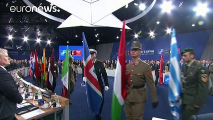 NATO summit opens in Warsaw aiming to stand firm against Russia