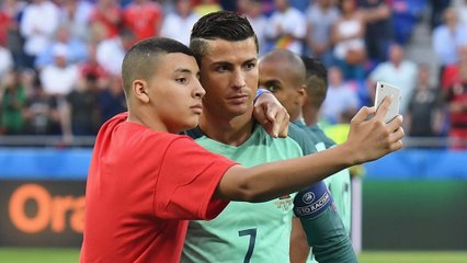 Cristiano Ronaldo Lets Ball Boy Crash Team Pic & Takes Selfie with Him
