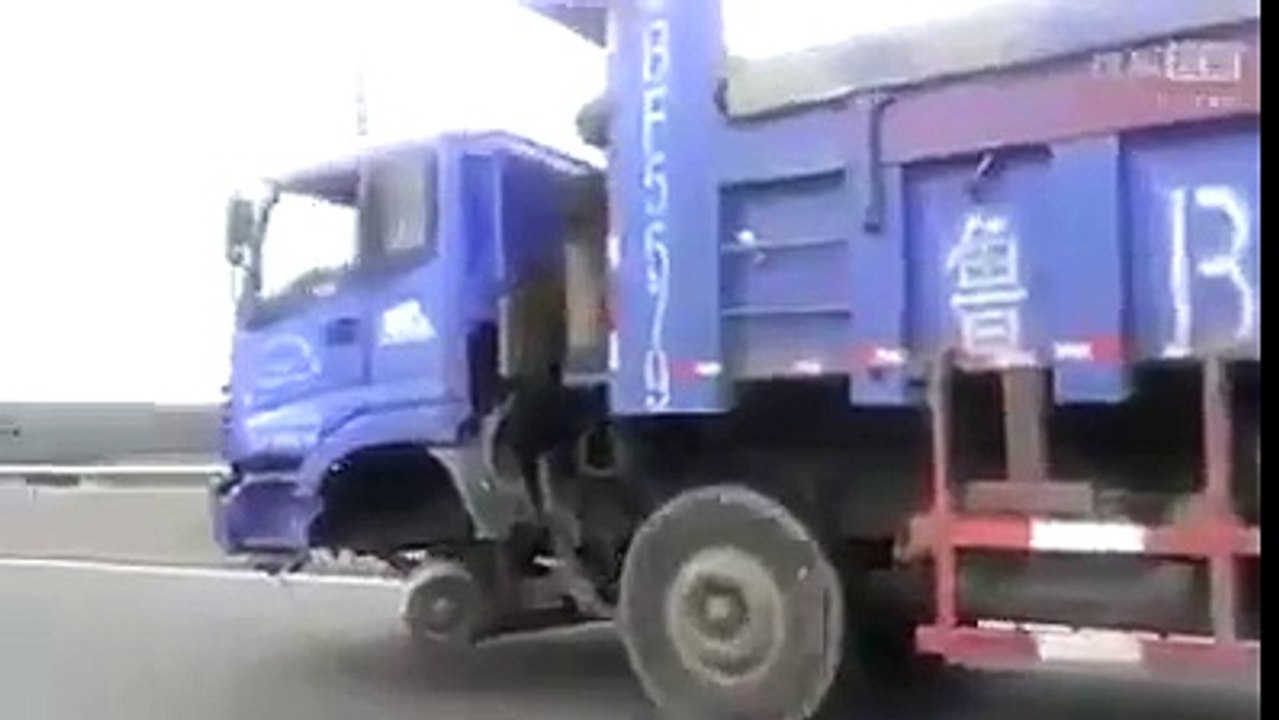 Man driving truck without tyre