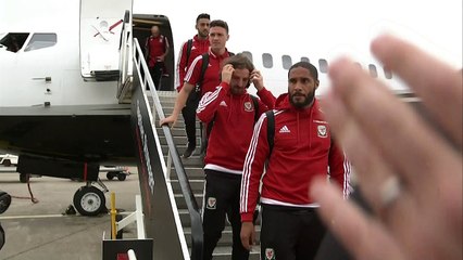 Wales team arrives back in Cardiff