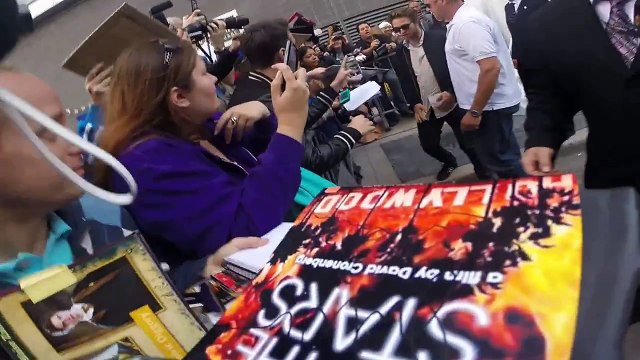 TIFF Robert with fans signs autographs after Press Conference MTTS 09.09.2014