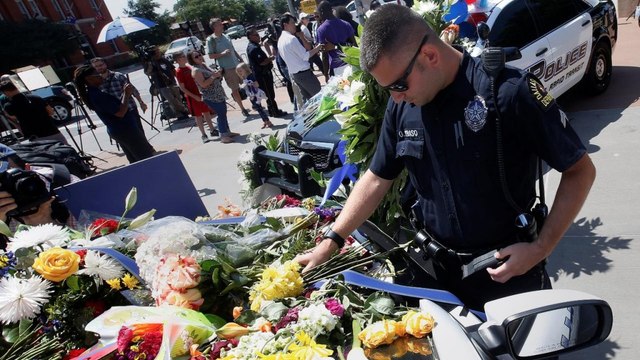 Dallas residents ‘soul searching’ after police ambush