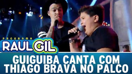 Guiguiba canta com Thiago Brava no palco