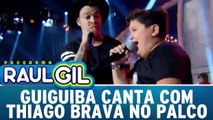 Guiguiba canta com Thiago Brava no palco