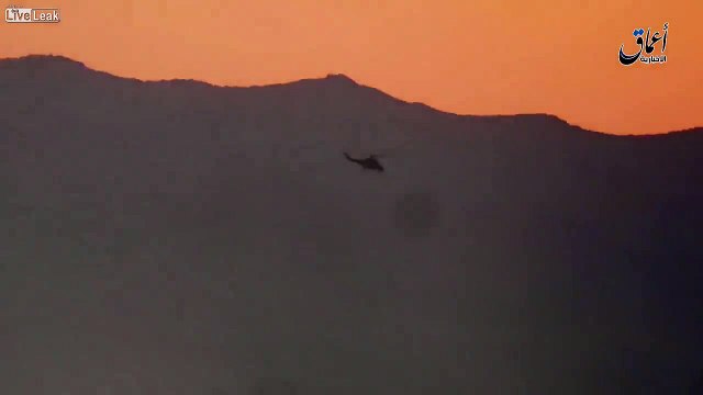 Syria - Amaq video: Russian helicopter Mi-24 Hind is shot down by IS near Palmyra, pilots are dead