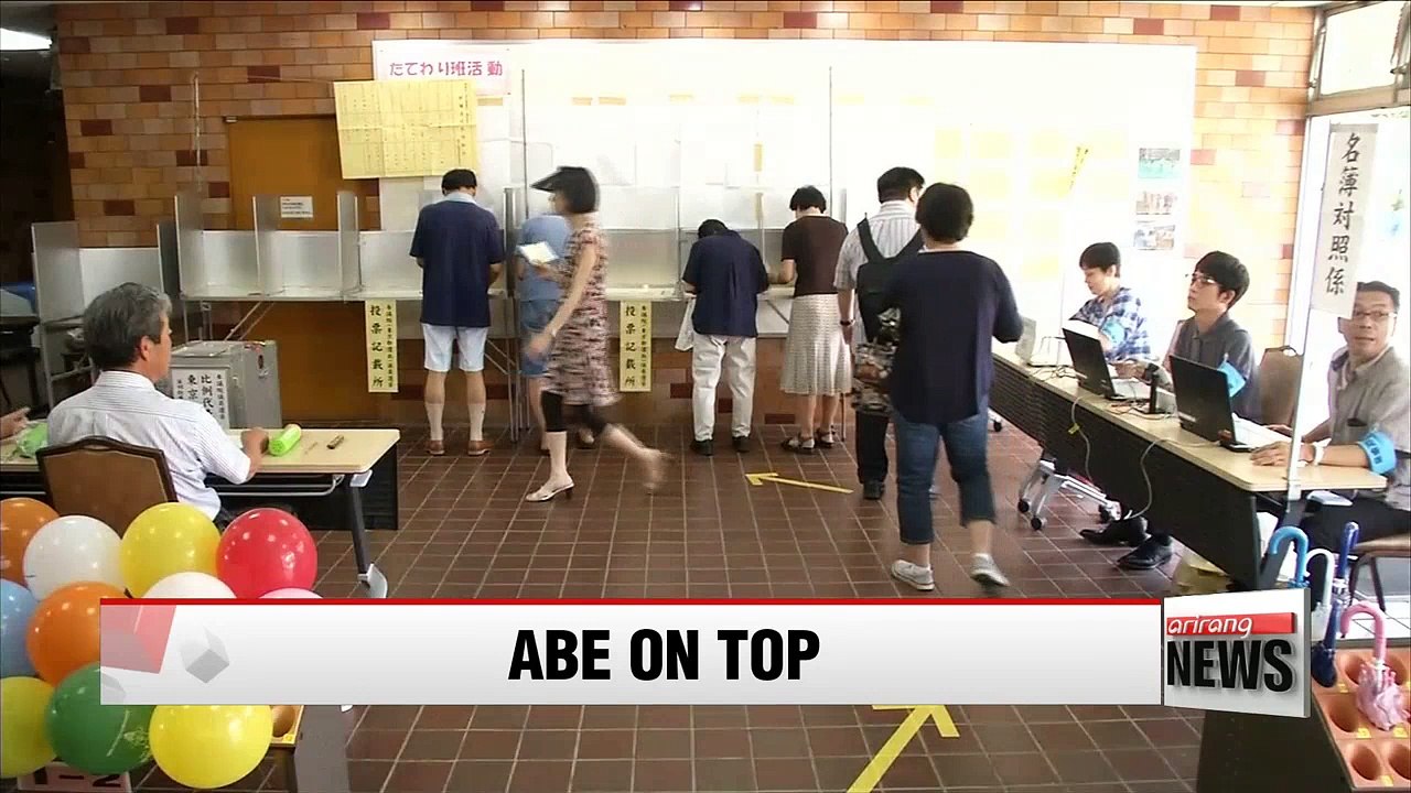 Japan's ruling bloc reach PM Abe's ambitious goal in national election