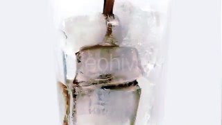 Coke Poured Over Ice Cubes In Glass - Stock Footage | VideoHive 15461519