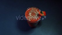 Glass of Juice Decorated With a Slice of Tomato - Stock Footage | VideoHive 15468241